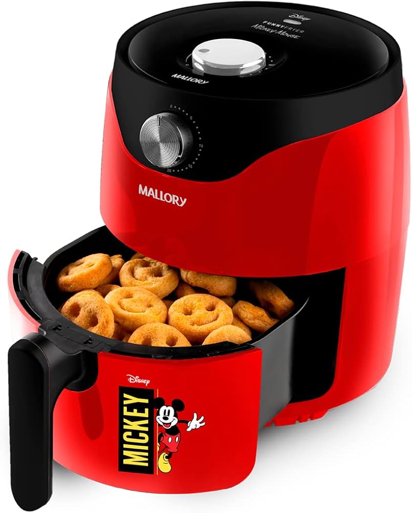 Fritadeira elétrica vermelha com cesto aberto e alimentos dentro