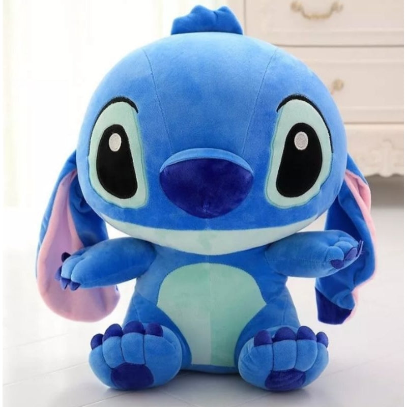 Pelúcia Stitch azul sentado